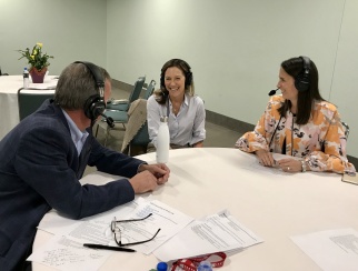 Gregg Renfrew (center) chats with co-hosts Katie McBreen (right) and Bill Thorne (left).